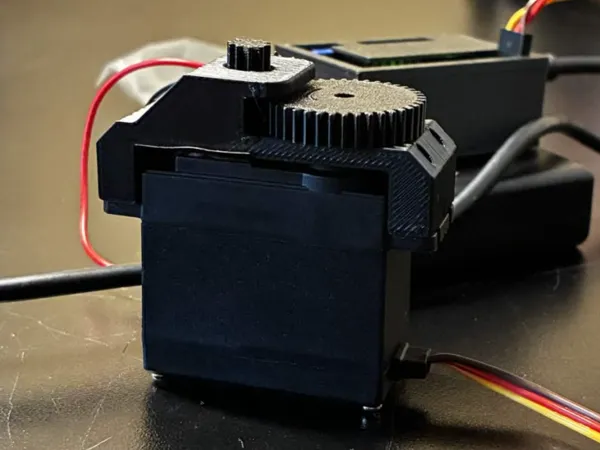 Mécanisme de servomoteur multi-tours
