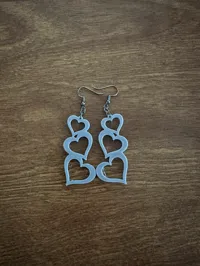 Boucles d'oreilles pendantes à trois cœurs — photo 2