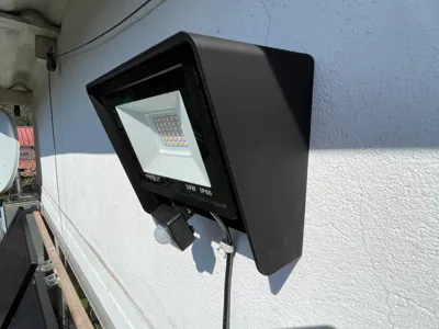 Weather protection for outdoor lamp