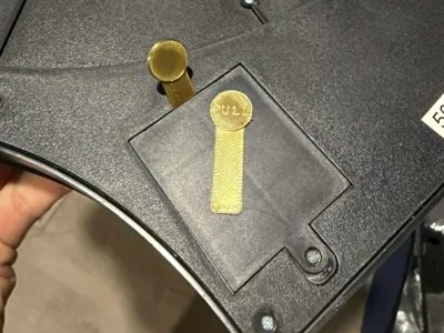 Battery pull tab for storage