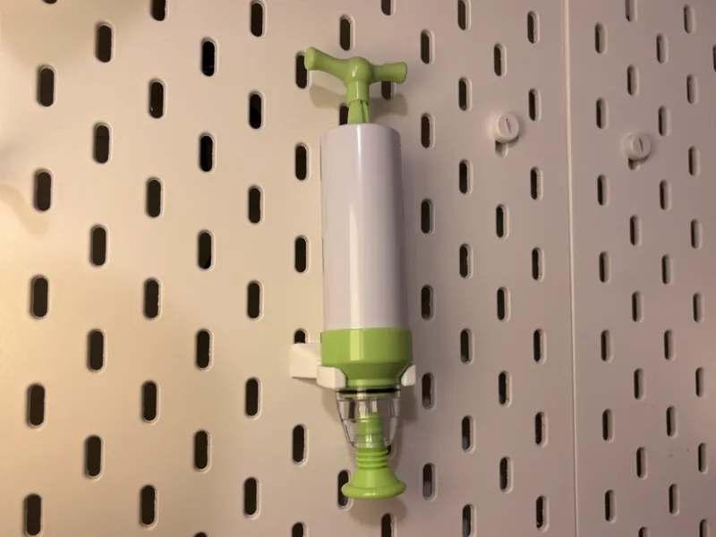 IKEA SKADIS manual hand vacuum pump holder